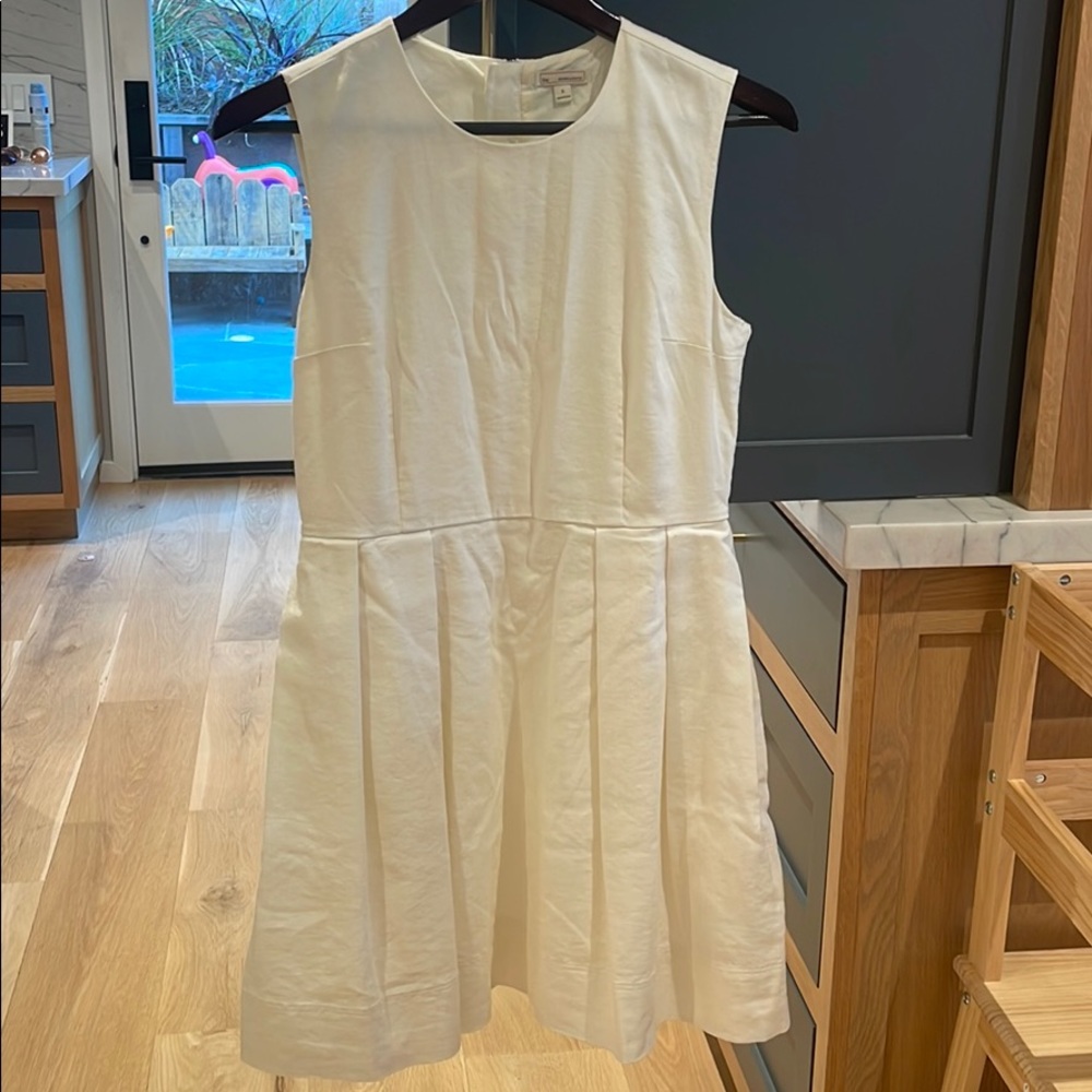Lined, linen blend cream dress with pleated skirt